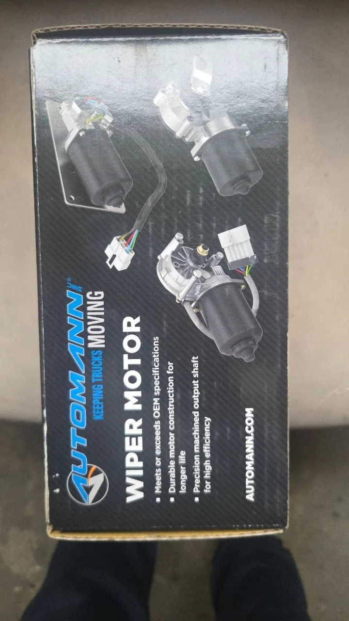 Image 5: Shop-supplied photo of Automann wiper motor packaging; actual used motor and part number not shown.