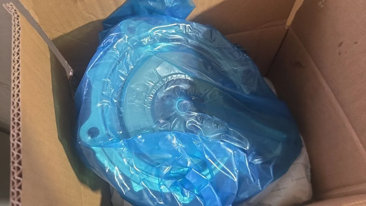 Shop-supplied photo of a wrapped part identified as a Volvo VNL water pump; no readable part number or fitment marking is visible.