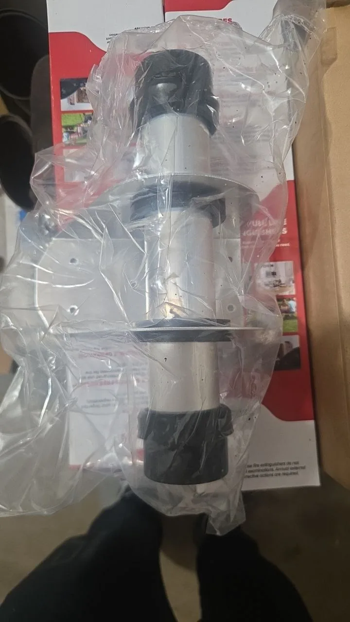 Supplied photo of used Volvo component in clear bag; identification pending.